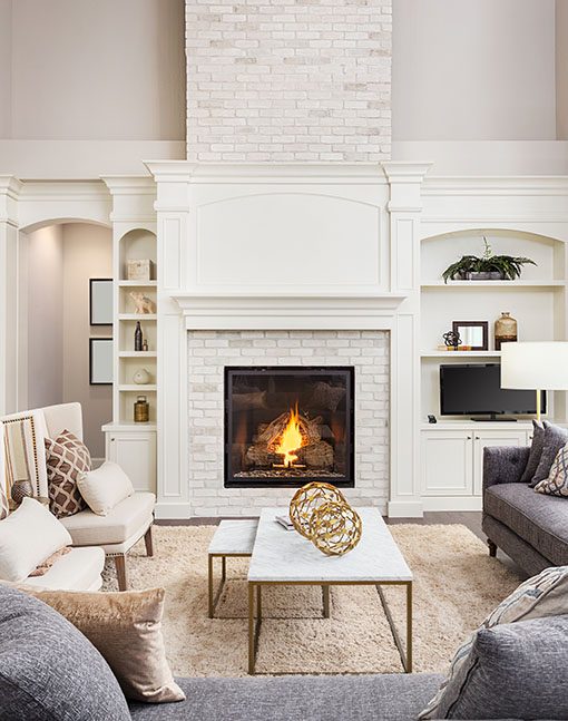 shutterstock_644446420 A white living room with a fireplace